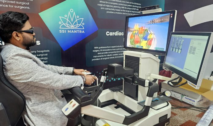 A delegate trying out a robotic equipment during ‘Valley Urocon’ workshop held at GMC Srinagar on Saturday. -Excelsior/Shakeel