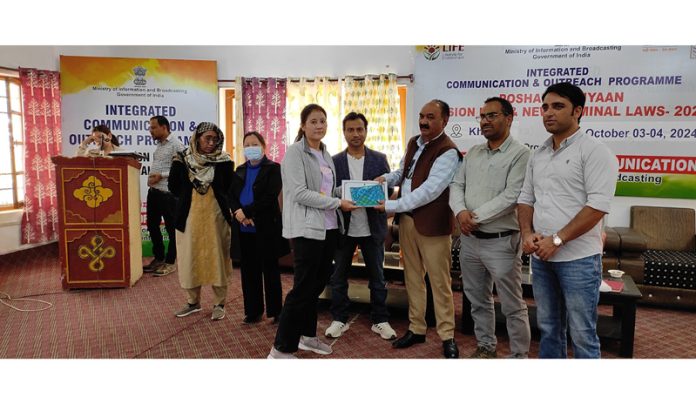 Students receiving mementoes and certificates during an Outreach Programme organised by CBC at Khaltsi on Thursday.