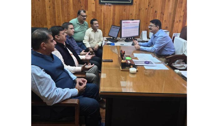 CCI Jammu president Arun Gupta and other office bearers in a meeting with the Commissioner State Taxes Department.