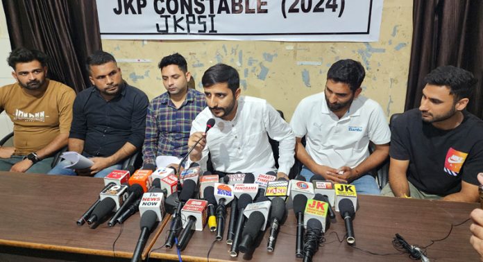 Aspirants of JKP Constable talking to media persons at Jammu on Tuesday.