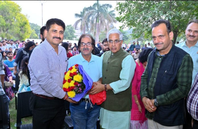 JU Vice-Chancellor with officers and artists during Diwali Milan organized by Department of Students Welfare on Tuesday.