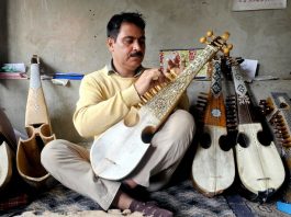 Mushtaq Ahmad Dar a third generation Rabab maker at his workshop in Narbal area of Central Kashmir's Budgam district. - Excelsior/Shakeel