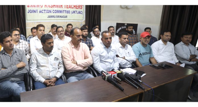 Members of Teachers Joint Action Committee addressing press conference in Jammu. —Excelsior/Rakesh