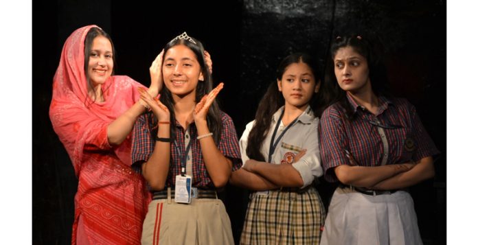 A scene from play ‘Miss World Undeclared’ being staged at Jammu on Sunday.