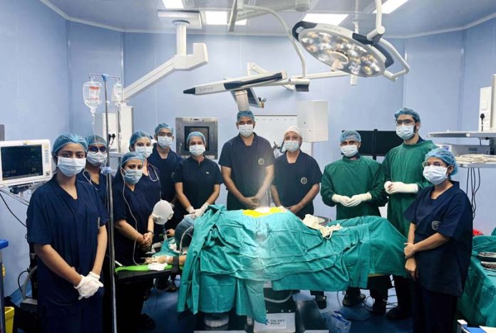 Surgical team of AIIMS Jammu posing together after performing first spine surgery in the Institution.