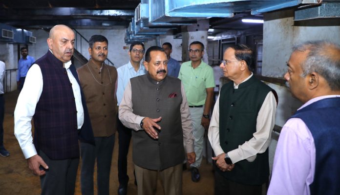 Union Minister Dr. Jitendra Singh, accompanied by Principal Secretary to PM P.K. Misra, Advisors to PM Amit Khare and Tarun Kapoor and other senior officers, walking through the corridors of PMO in South Block, New Delhi on Monday.