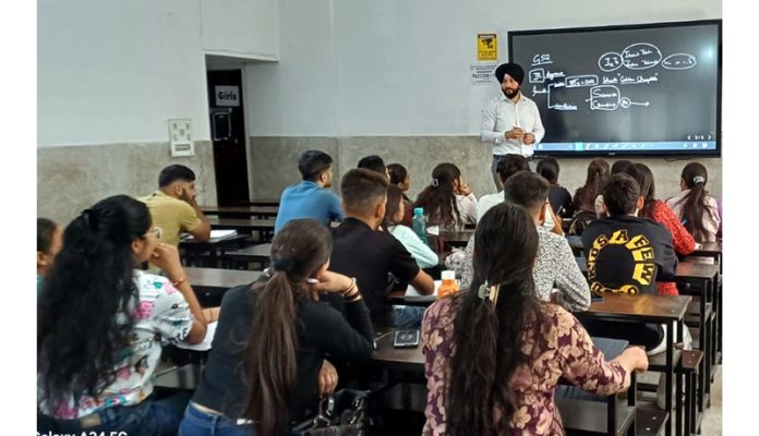 Harnit Singh Sudan delivering lecture to IAS aspirants at SR College of Competition on Sunday.