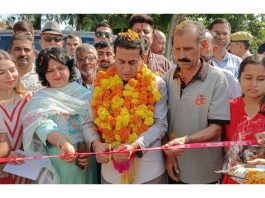 MLA Rajiv Jasrotia kick starting construction of lanes and drains in Panchayat Logate on Thursday.