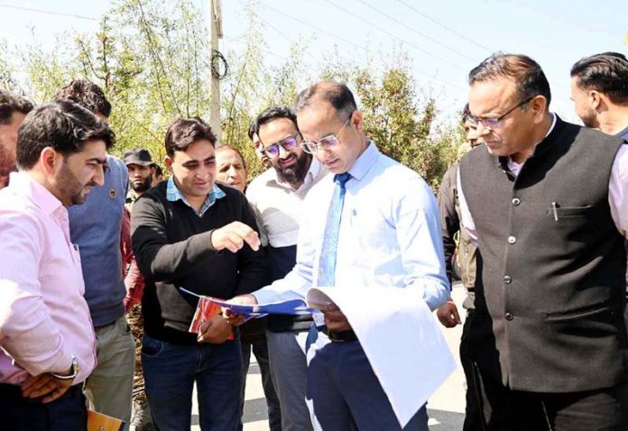 DDC Shopian Mohammad Shahid Saleem Dar interacting with officers on Monday.