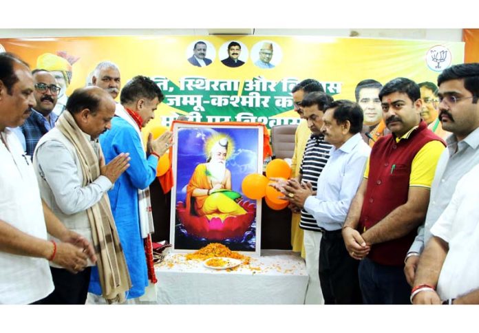 BJP leaders paying tribute to Maharishi Valmiki at Jammu on Thursday.