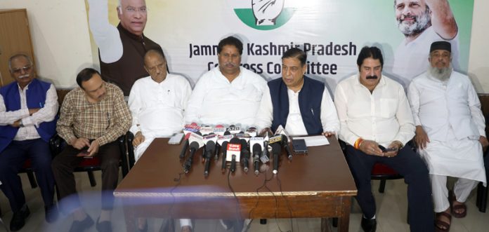 J&K Cong working president flanked by Mula Ram, Ravinder Sharma and others addressing joint press conference in Jammu. -Excelsior/Rakesh