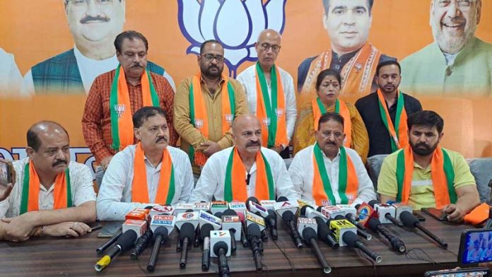 BJP candidate from Jammu East Yudhvir Sethi along with other party leaders at a press conference in Jammu on Thursday.