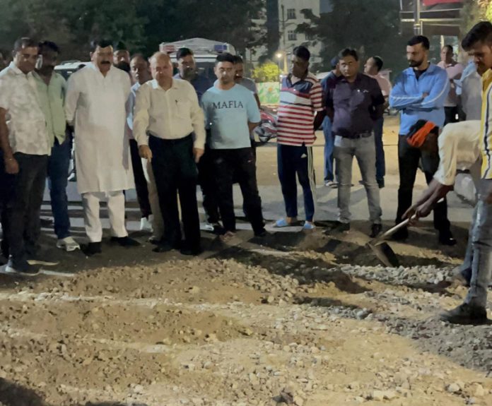 MLA Jammu West, Arvind Gupta kick starting blacktopping of road from Medical College to Canal Road on Monday.