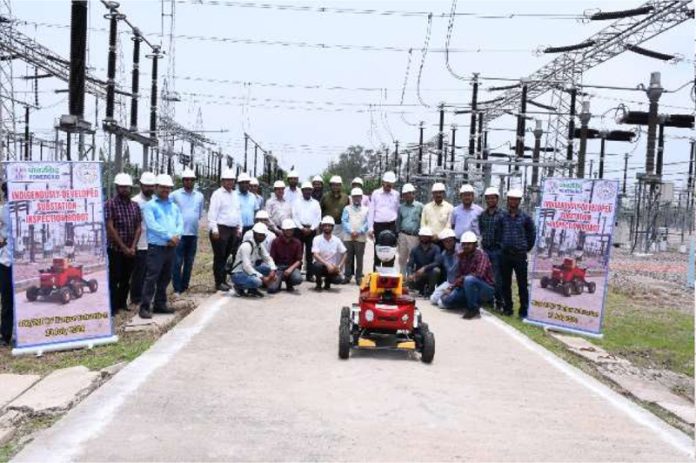 The officials of POWERGRID posing along with country's first robot developed for inspection of substations on Monday.