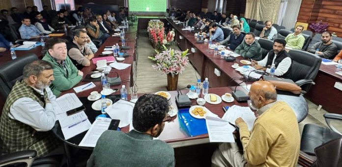 MP Er Rashid chairing a meeting.