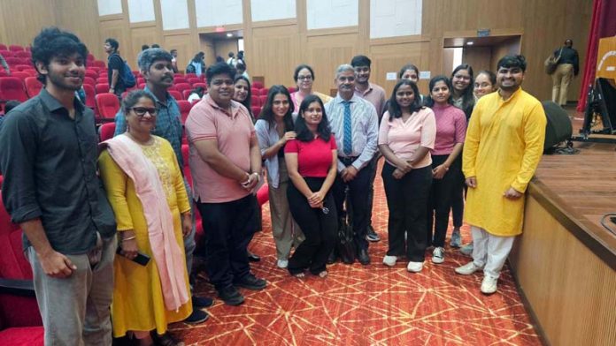 Guest speaker with students and faculty members of IIM Jammu.