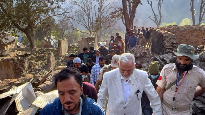 Former Minister Ghulam Mohammad Saroori during visit to fire-hit area of Mulwarwan in Kishtwar on Friday.