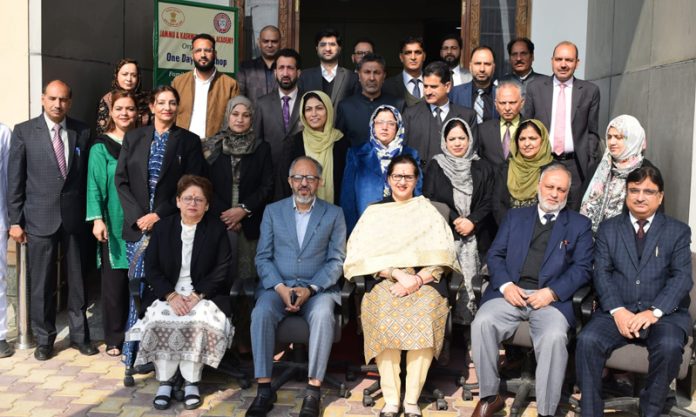 Justice Sindhu Sharma along with other officials posing for a group photograph at J&K Judicial Academy Srinagar.