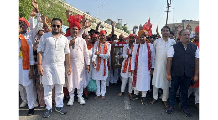 Workers of Dogra Front & Shiv Sena taking out Charri Yatra from Jammu to Mata Vaishno Devi Shrine on Thursday.