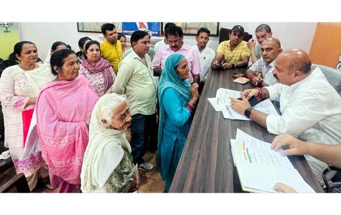 BJP MLA East constituency, Yudhvir Sethi listening public grievances at Kacchi Chawni BJP Office on Thursday.