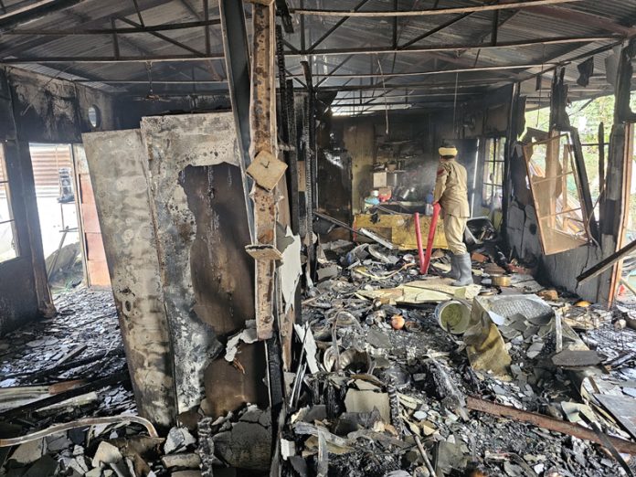 A fire ravaged residential structure at Purkhoo Camp. -Excelsior/Rakesh