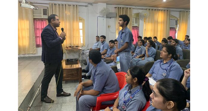 Shivendra Pratap Singh from OP Jindal Global University addressing students during a workshop.