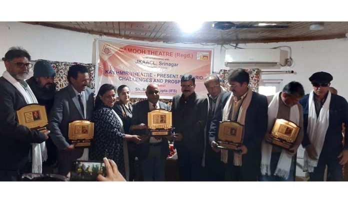 Noted theatre directors from Kashmir posing together after being honoured during a function in Srinagar.