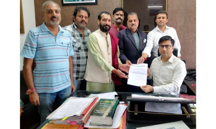 Members of Movement Kalki presenting a memorandum to Assistant Commissioner Jammu Angrez Singh Mankotia.