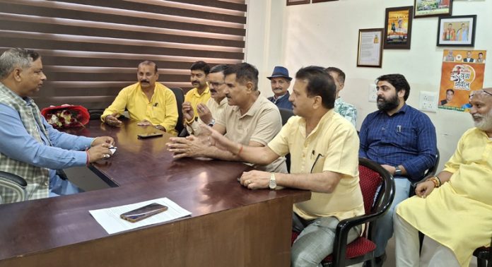 BJP working president Sat Sharma chairing a meeting in Jammu on Thursday.