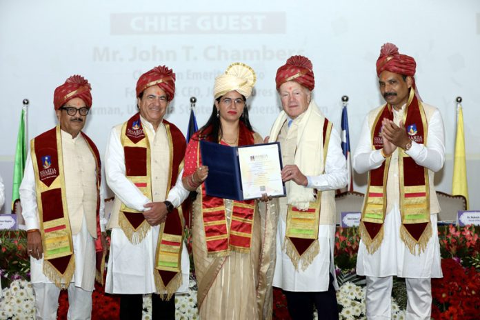 John T. Chambers, Chairman CISCO awarding degrees to the students during a function on Thursday.