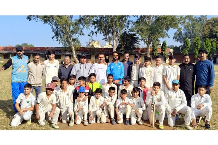 Players posing for group photograph during a match.