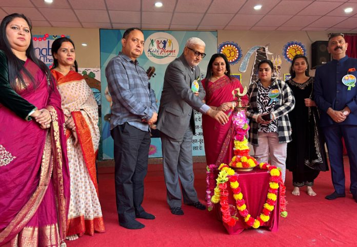 Sham Lal Sharma, MLA lights ceremonial lamp to inaugurate the celebration of annual day of Kids Planet Public School, Akhnoor.