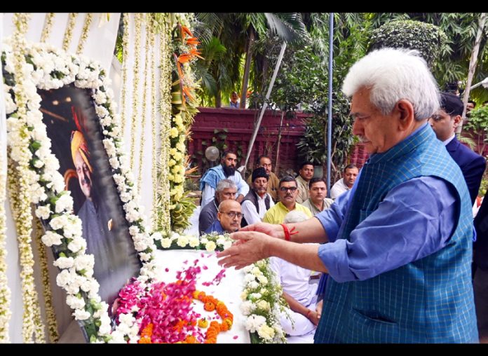 LG paying tribute to Devender Singh Rana at his residence.