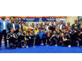 Winners displayiing their trophies and medals on culmination of Wushu Championship in Jammu on Tuesday.