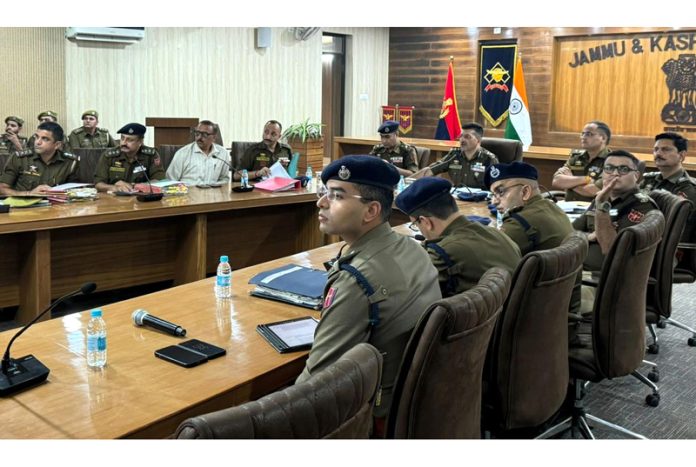 SSP Jammu, Joginder Singh, chairing a meeting of police officers in Jammu on Sunday.