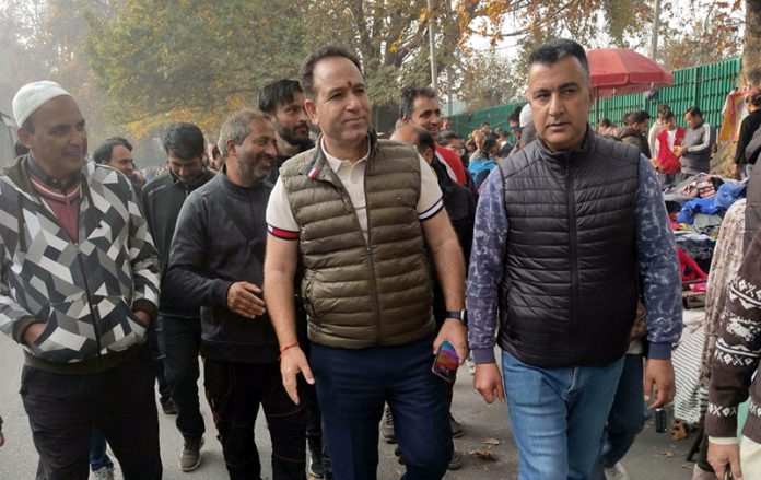 BJP senior leader and Leader of Opposition in Jammu and Kashmir Legislative Assembly Sunil Sharma visited Sunday market. (UNI)