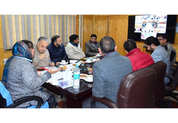 Minister Sakina Itoo chairing a meeting.