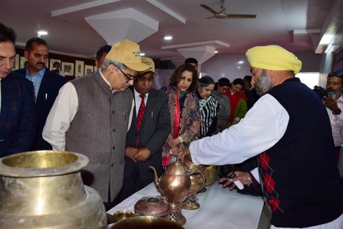 CS being briefed about rare artefacts at Abhinav Theatre.