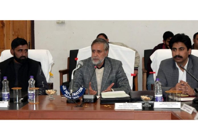 Parliamentary Constituency Mian Altaf Ahmad chairing a meeting.