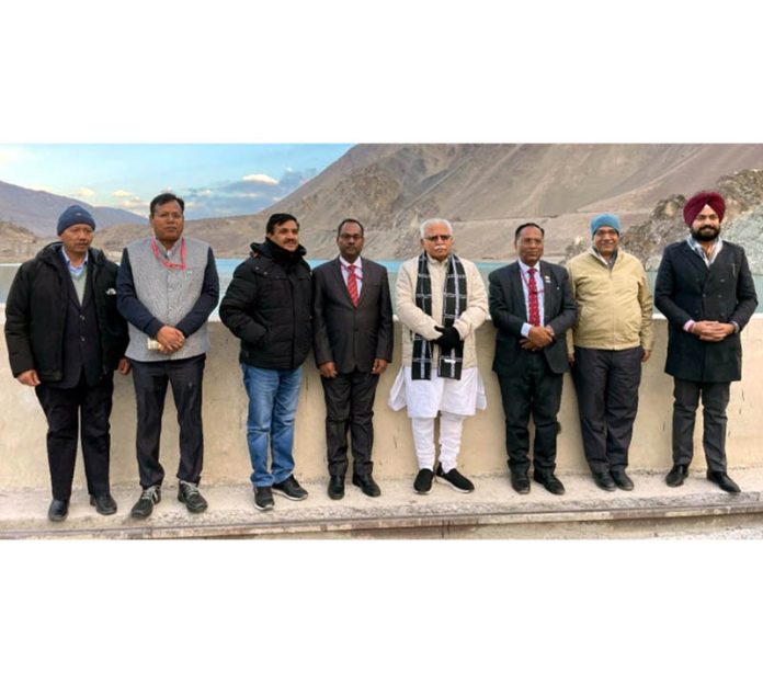 Union Minister Manohar Lal Khattar and NHPC dignitaries during their visit to Nimoo Bazgo Power Station in Leh on Saturday.