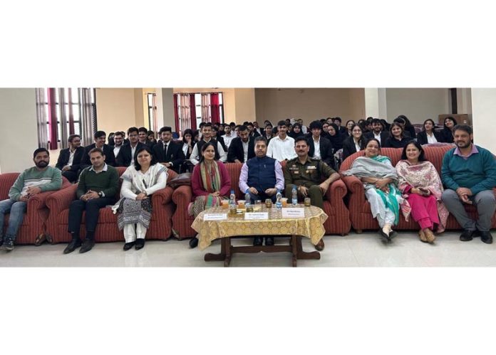 Guests along with faculty members and students of The Law School during a symposium.