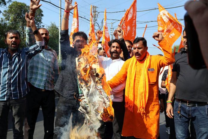 Members of Rashtriya Bajrang Dal protesting against National Conference president Dr Farooq Abdullah in Jammu on Monday. (UNI)