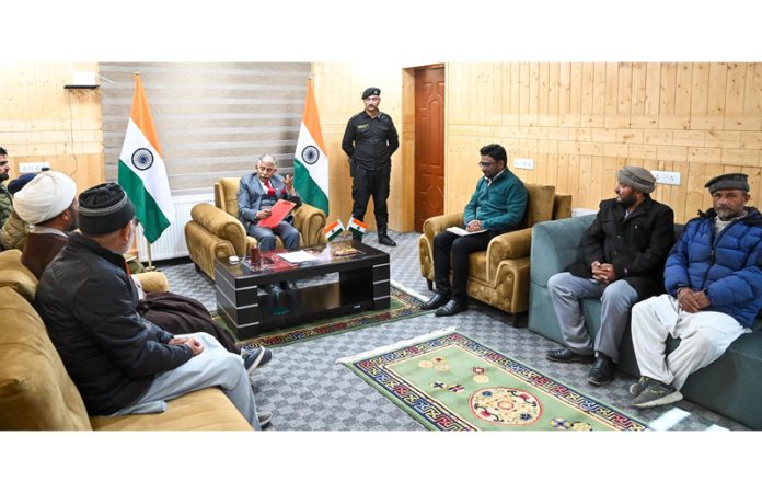 LG BD Mishra interacting with various delegations in Kargil on Friday.