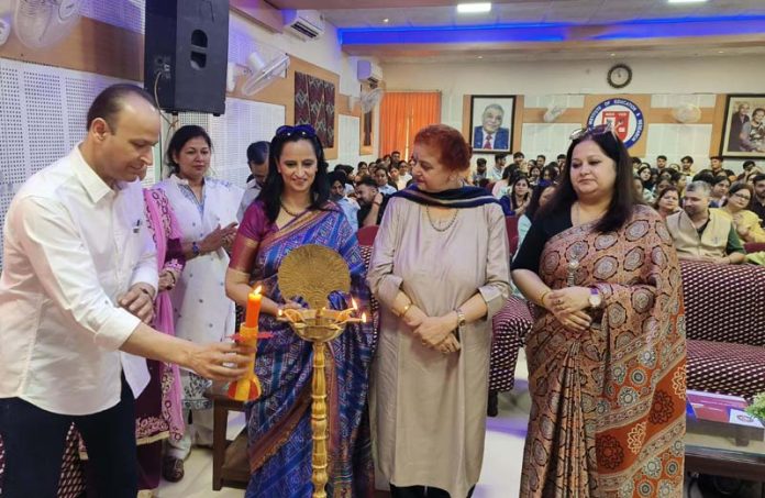 Guests lighting ceremonial lamp at inaugural of JU's Display Your Talent 2024 - Tawi Zone at MIER College.