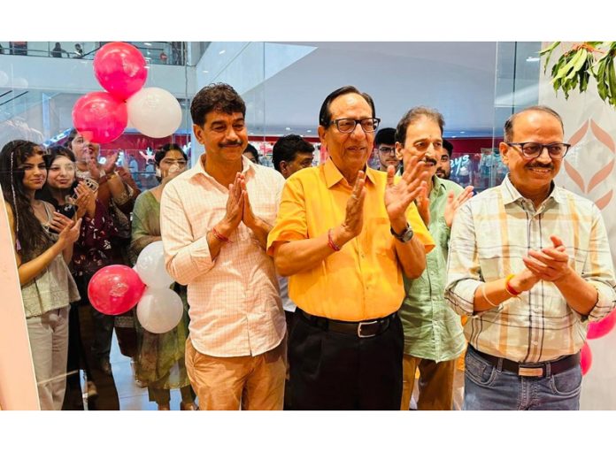 Y V Sharma, former President CCIJ inaugurating a showroom in Jammu on Saturday.