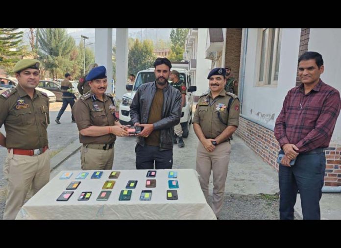 People getting back their lost smart phones from Police in Ramban on Wednesday.