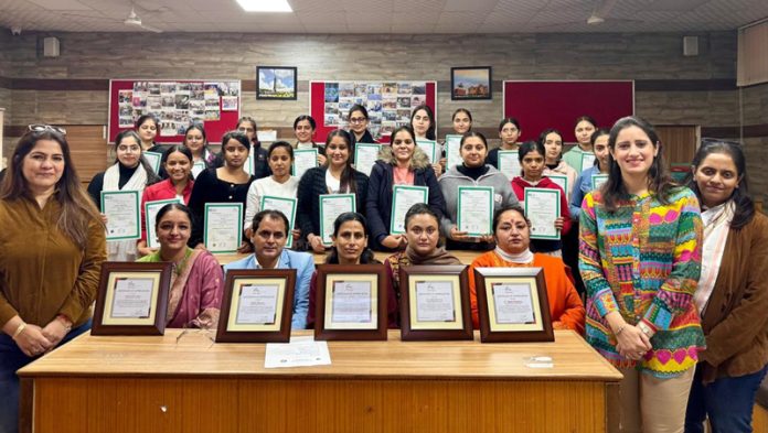 Ruchika Gupta, Chairperson, FICCI FLO JKL posing along with the students during an event held in Jammu on Friday.