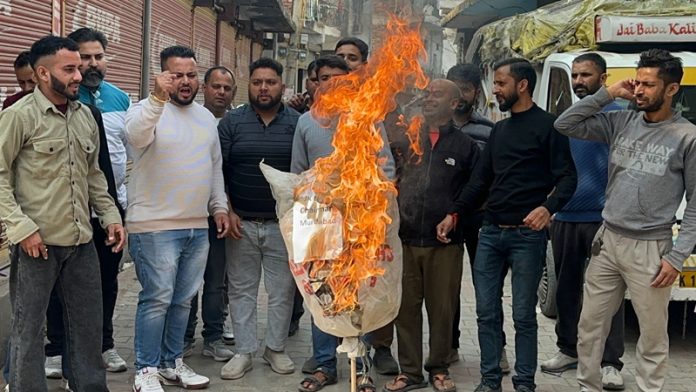 Locals burning effigy during a protest at Udhampur.