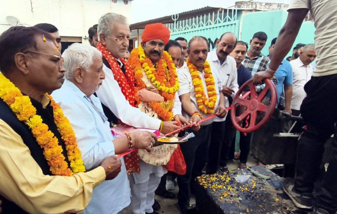 MLA Akhnoor and others perform Puja to kick start road macadamization in Devipur.