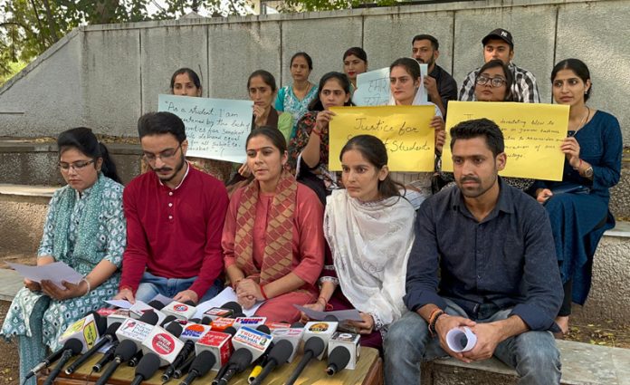 Sanskrit scholars talking to media persons at Jammu University Campus on Wednesday.